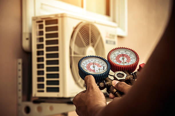 Professional Ductwork Repair technician working in Vinemont, AL